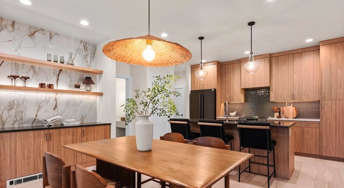 Open kitchen and dining room showing flooring and two backsplash installations